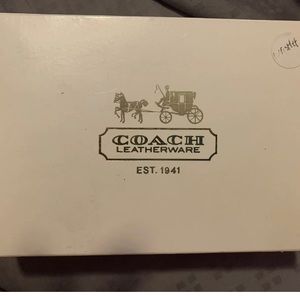 Two Coach Wristlet Wallets